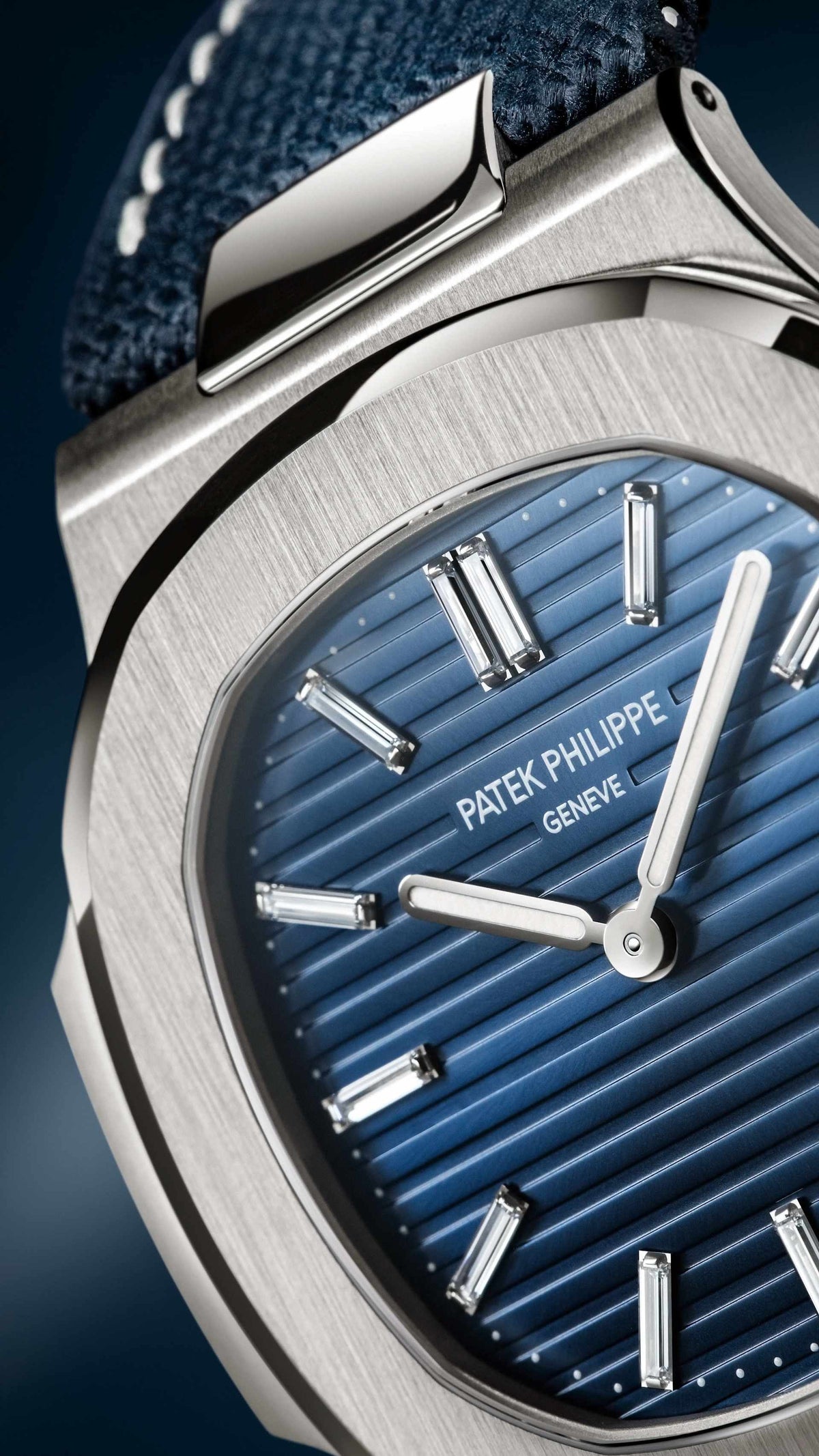 Patek Philippe Nautilus 5810G-001 White Gold Blue Dial Baguette Hour Markers Automatic 41 mm