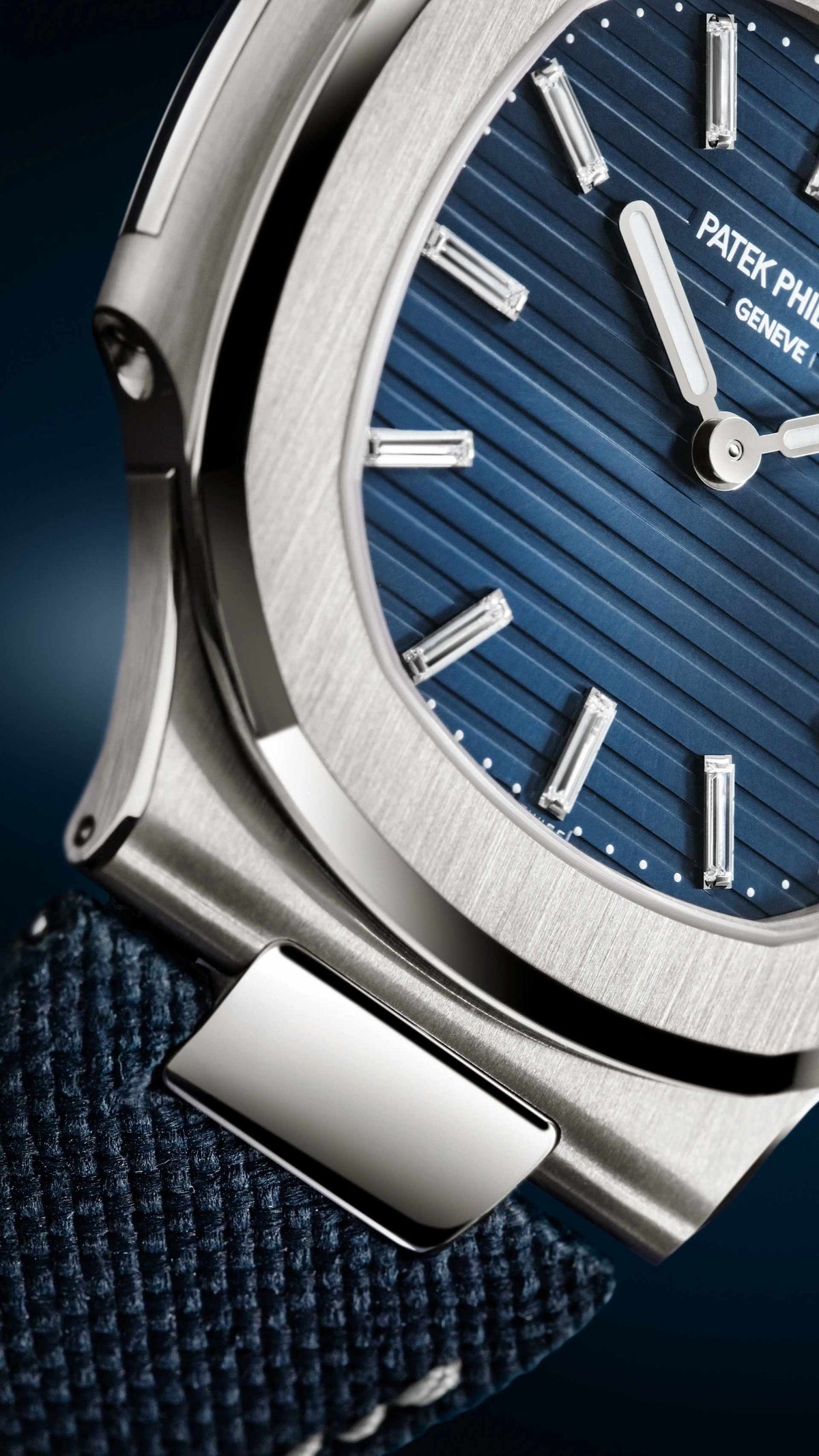 Patek Philippe Nautilus 5810G-001 White Gold Blue Dial Baguette Hour Markers Automatic 41 mm